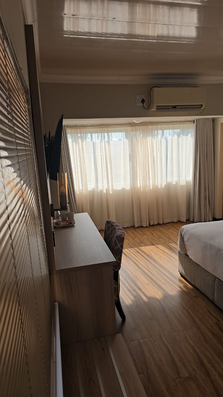 Bright bedroom with sheer curtains
