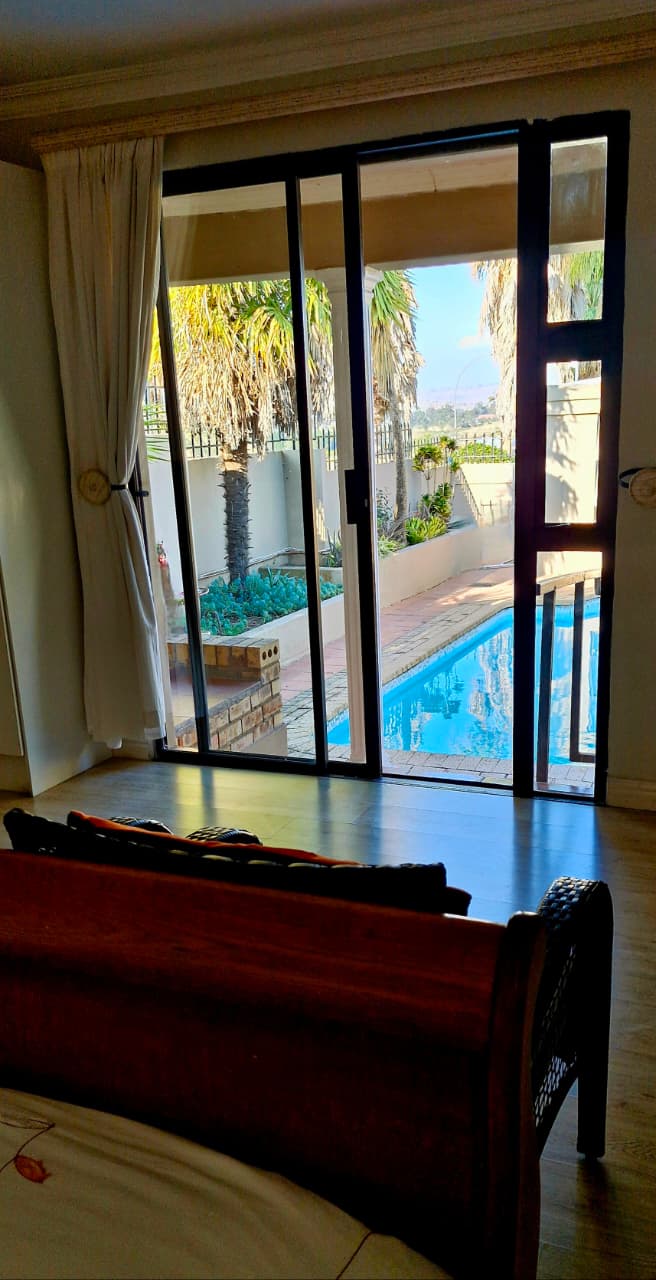 Pool and mountain view from guest room