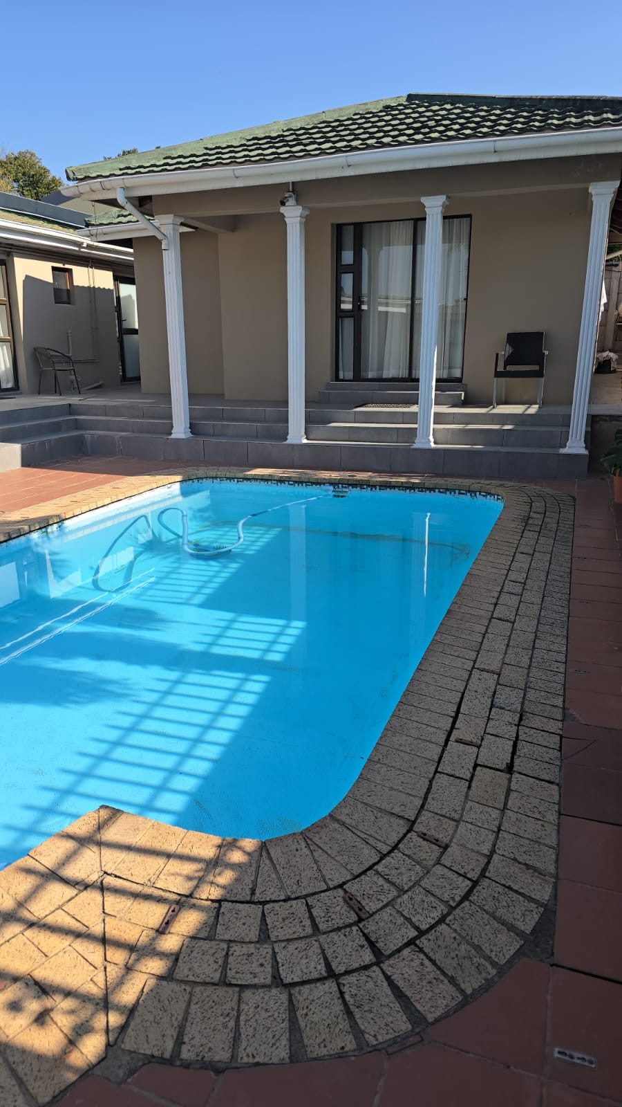 Pool deck and patio dining area