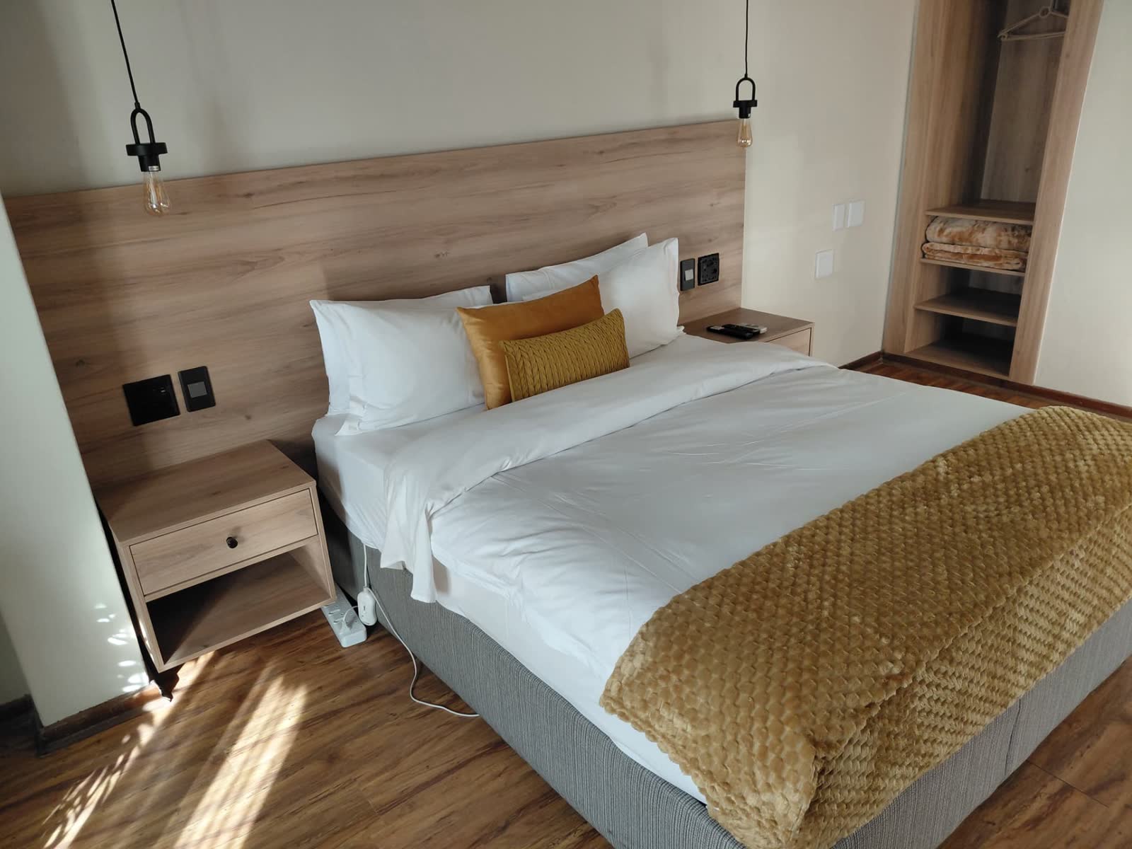 King room with built-in wardrobe and bedside tables